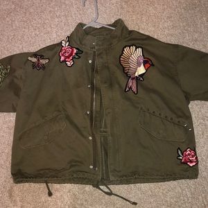 Green zip/button jacket with patches